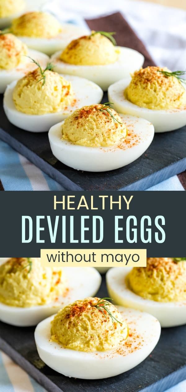 deviled eggs with mayonnaise and herbs on a serving platter for healthy deviled eggs without mayonnaise