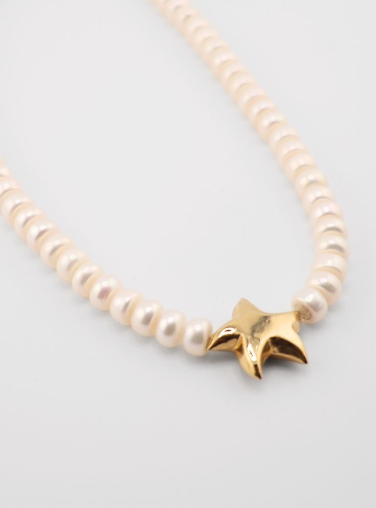 Handcrafted Starfish Pearls Necklace, embodying elegance and artistry. Drape yourself in this luxurious accessory, adorned with lustrous pearls and a delicate starfish pendant. Every piece is unique They are made by hand in Florida. Available in 16" and 18". Both sizes feature a 2" extension chain.” long Elegant Starfish Charm Star Necklace, Elegant Starfish Charm Necklace, Elegant Star-shaped Necklace With Starfish Charm, Starfish-shaped Necklace With Pearl Charm For Gift, Elegant Starfish-shaped Pearl Charm Jewelry, Pearl Necklace With Star Charm As Gift, Pearl Necklace With Star Charm For Gift, Star-shaped Pearl Charm Jewelry, Star-shaped Pearl Jewelry For Gift