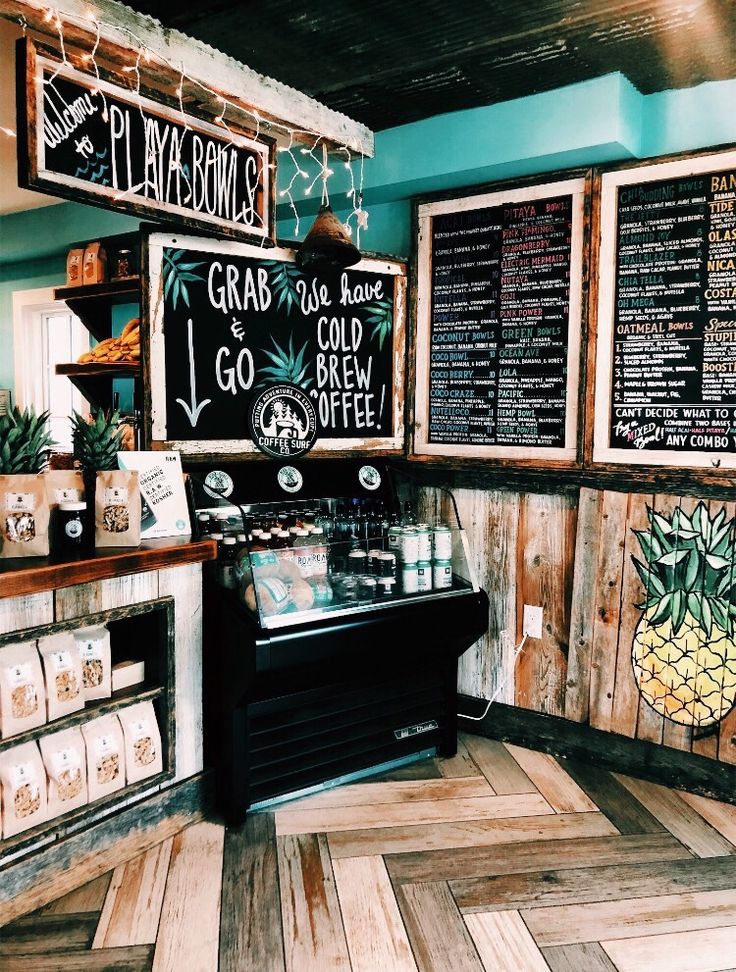 the inside of a restaurant with menus and drinks