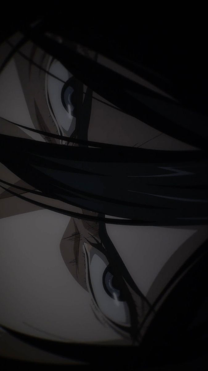 the eyes of an anime character with long black hair and big blue eyes are shown