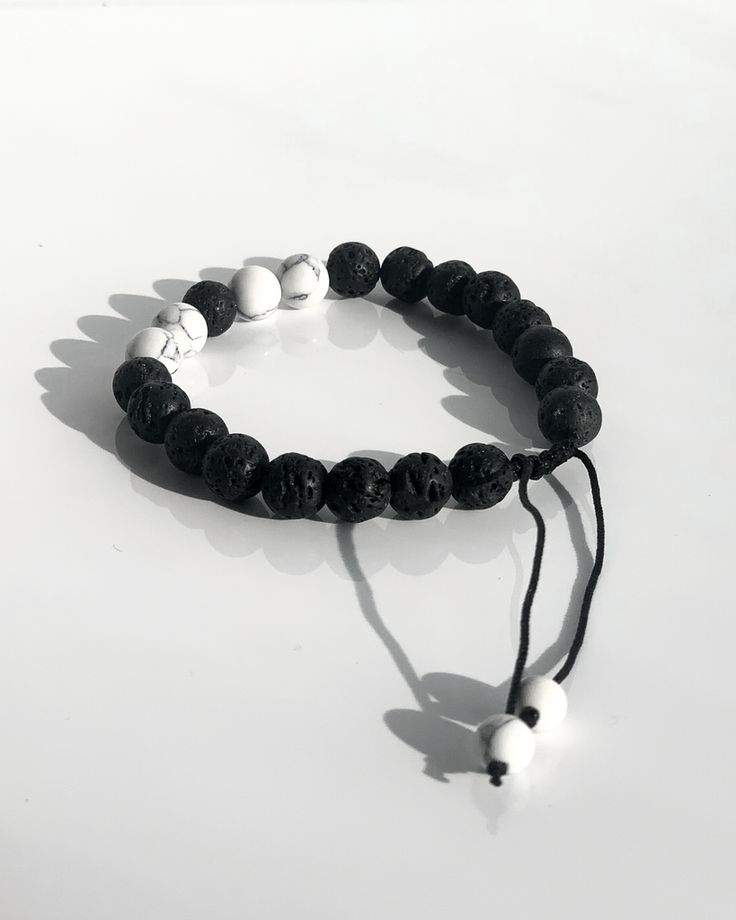 Hand-strung Lava Stone Bracelets, Adjustable Lava Stone Stretch Bracelet For Meditation, Adjustable Lava Stone Bracelet For Meditation, Meditation Bracelets With Natural Lava Stones, Casual Hand-strung Bracelets For Meditation, Adjustable Lava Stone Beaded Bracelets, Adjustable Hand-strung Lava Stone Bracelet, Spiritual Lava Stone Bracelets With 8mm Beads, Casual Hand-strung Lava Stone Beaded Bracelets