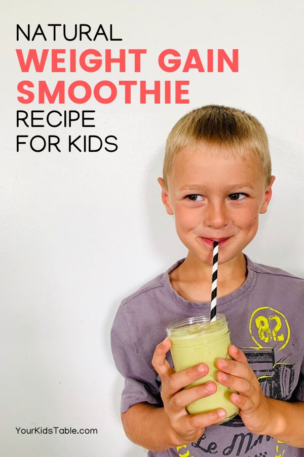 a young boy drinking a smoothie with a straw in his mouth and the text natural weight gain smoothie recipe for kids