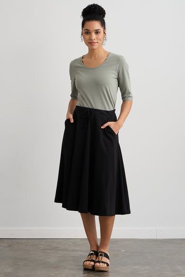 Knee-length Cotton Relaxed Fit Skirt, Chic Mid-rise Cotton Skirt, Medium Wash Knee-length Cotton Skirt, Mid-rise Cotton Skirt In Medium Wash, Black Cotton Knee-length Skirt, Black A Line Skirt, Cotton Midi Skirt, Line Skirt, Casual Black