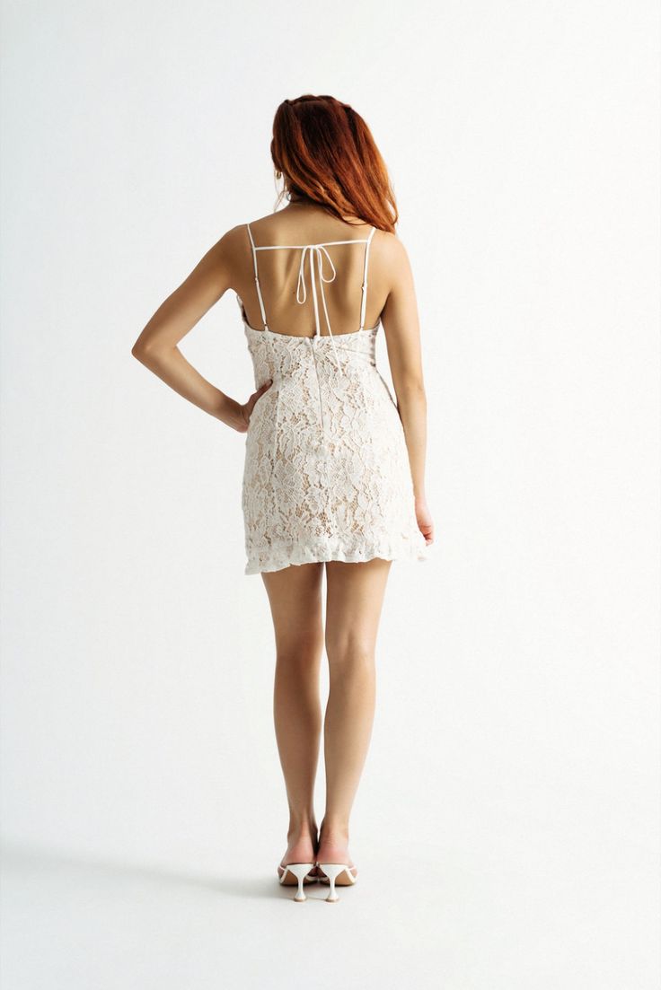 Back In Time White Graduation Dress Flirty Lace Dress With Sweetheart Neckline And Lace Trim, Lace Dress With Delicate Straps For Date Night, Spaghetti Strap Lace Dress With Lace Back For Wedding, Wedding Lace Dress With Spaghetti Straps And Lace Back, Lace Back Wedding Dress With Spaghetti Straps, Lace Dress With Lace-up Back For Brunch, Flirty Lace Mini Dress With Lace-up Back, Wedding Mini Dress With Lace Trim And Spaghetti Straps, Wedding Mini Dress With Spaghetti Straps And Lace Trim