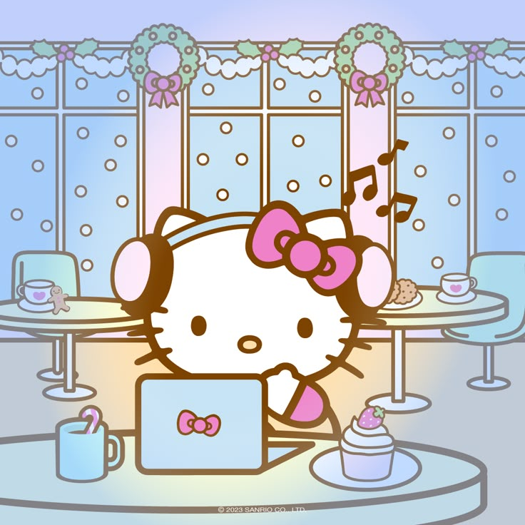 a hello kitty sitting at a table with a laptop computer in front of her face