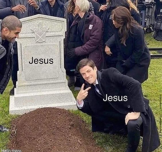 a man kneeling down next to a grave with the words jesus written on it in front of him