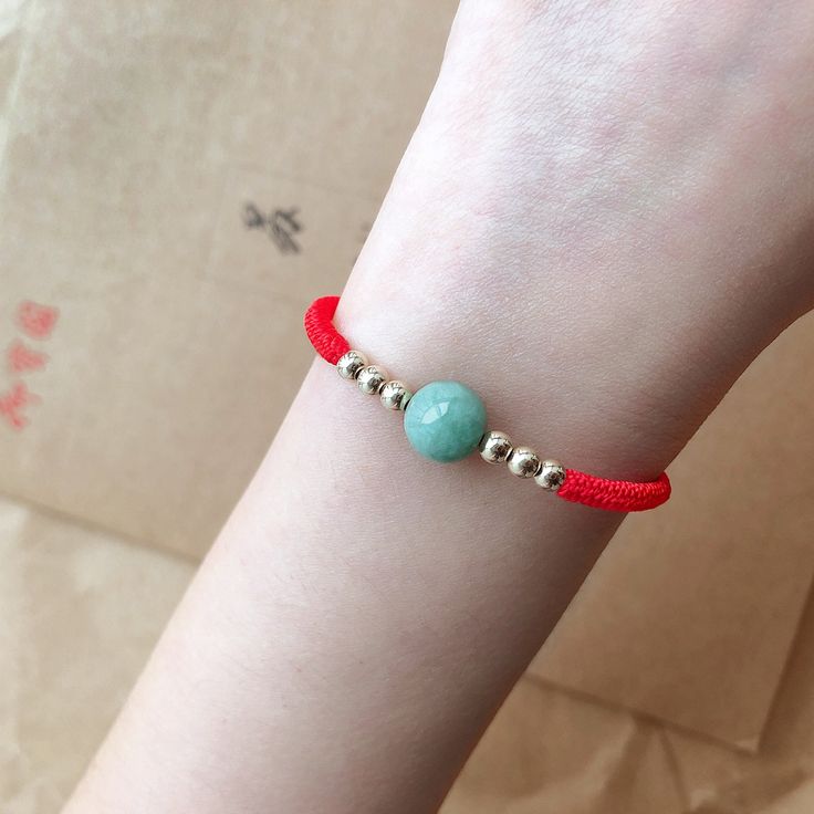 🍀 personalized：【yes 】➜Please feel free to contact me. 🍀 Bead Materials ：real jade & 4mm 14k gold beads 🍀 length：【length is can be made as you want】 🍀 Rope colors：【Black//Red】-Other colors are available，Just give messages and tell me which color do you like. 🍀 processing time： 1-2 workdays 🍀 Moral of this bracelet The green jade that is in the middle of the bracelet is called safty gemstone, It is said that people wearing this bracelet will have good luck all day. It will be a great gif Yellow Gold Jade Bracelets As Gift, Yellow Gold Jade Bracelets For Gift, Spiritual Red Jade Jewelry, Yellow Gold Jade Beaded Jewelry, Yellow Gold Jade Round Beads Jewelry, Jewelry Friendship, Red Bracelet, Red Bracelets, Gifts Fo