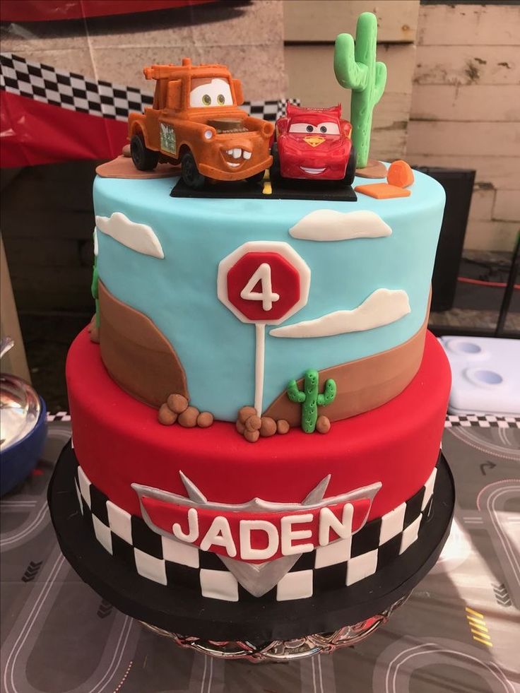 a birthday cake with cars on it