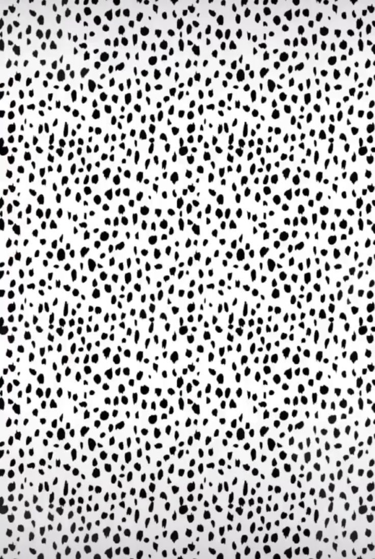 an abstract black and white background with dots