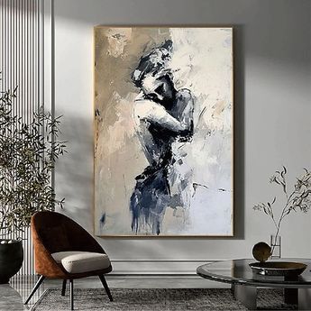 a painting hanging on the wall in a living room