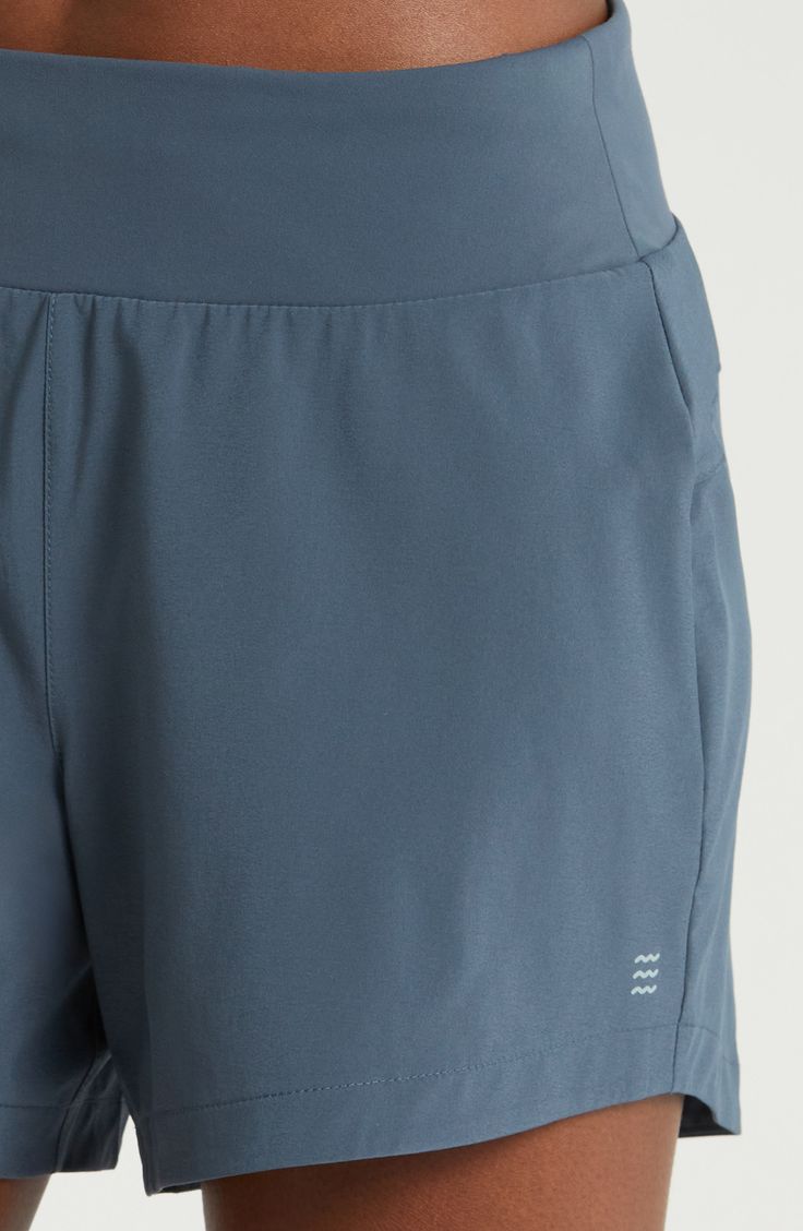 Functionality and style meet in lightweight athletic shorts boasting UPF 50+ sun protection and a side zip pocket to keep small valuables secure. 5" inseam Pull-on style Side zip pocket UPF 50+ sun protection Partially lined 86% recycled polyester, 14% spandex Machine wash, line dry Imported Blue Activewear With Built-in Shorts For Outdoor Activities, Casual Running Bottoms With Functional Pockets, Blue Bottoms With Built-in Shorts For Outdoor Activities, Blue Activewear For Summer Outdoor Activities, Blue Athletic Shorts With Elastic Waistband For Outdoor, Blue Activewear For Summer, Functional Short Bottoms With Comfort Waistband, Athletic Shorts With Functional Pockets, Functional Blue Shorts With Go-dry Technology