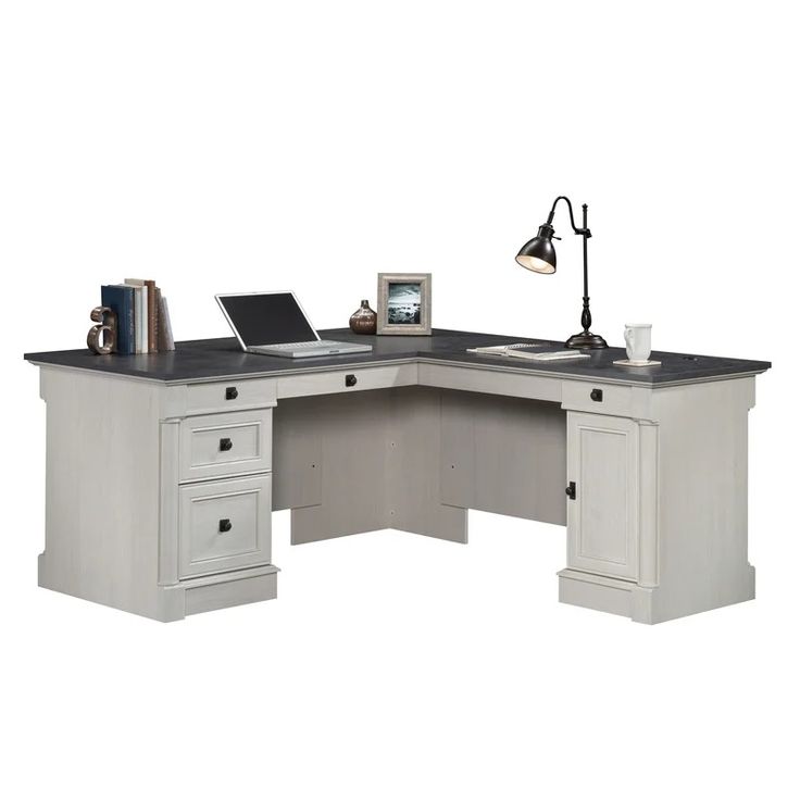 an l shaped desk with two drawers and a laptop on it, in front of a white background