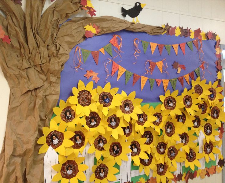 a bulletin board with sunflowers on it