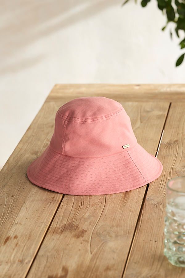 Handmade from lightweight and breathable cotton, this bucket-style version of our colorful crusher hat is perfect for a day at the beach or in the garden. Packable construction pairs with UPF 50 sun protection (96-99% of sun's rays) and an inner drawstring to assure a comfortable fit. | Cotton Bucket Hat in Brown at Terrain Cotton Sun Hat With Short Brim, Cotton Wide Brim Bucket Hat, One Size, Cotton Bucket Hat For Sun Protection, Cotton Sun Hat For Everyday Use, Solid Cotton Sun Hat For Everyday, Solid Color Cotton Sun Hat For Everyday, Everyday Cotton Sun Hat, Summer Brimmed Cotton Hats, Adjustable Cotton Bucket Hat With Uv Protection