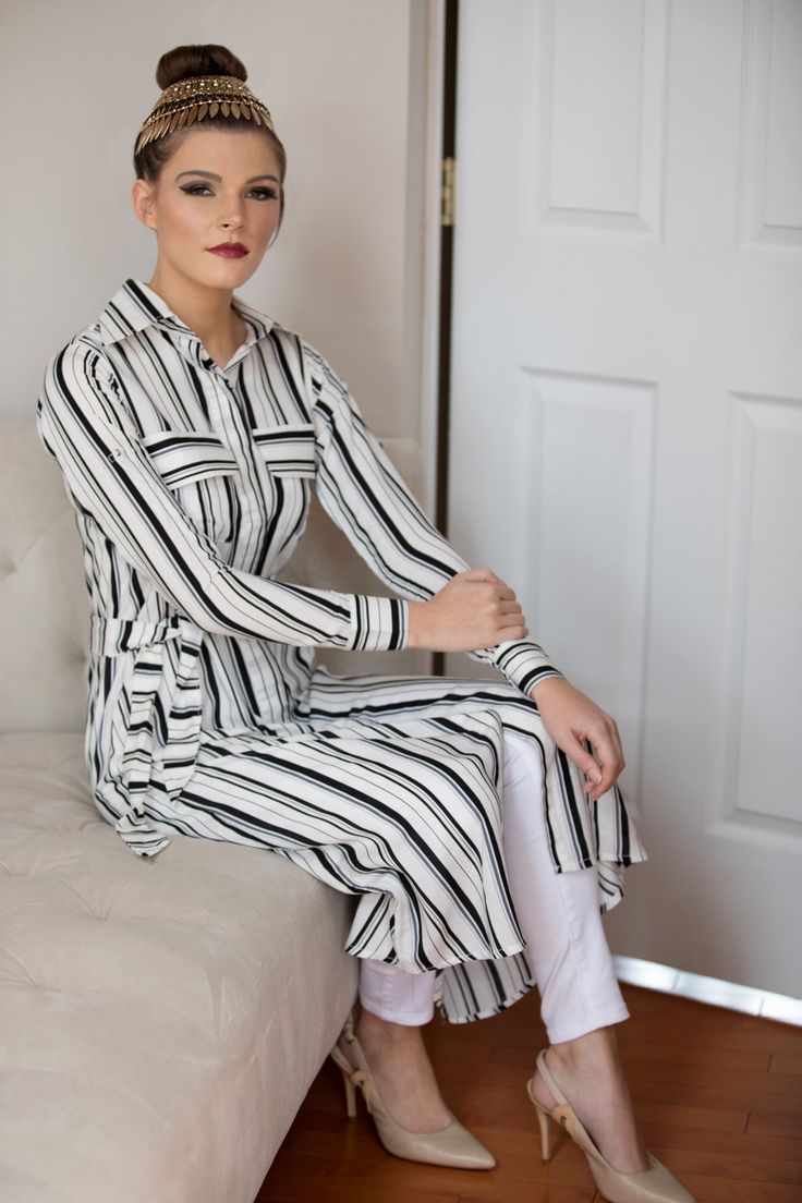 A wardrobe staple that we love just as much for the office as we do for off-duty dressing. Features a classic shirtdress silhouette, button down front, matching self-tie belt and two front patch pockets. V-neck with striped pattern Model wearing a size small