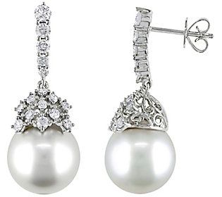 Make your entrance memorable by flaunting these timeless drop earrings boasting a lush arrangement of dangling cultured South Sea pearls surrounded by dazzling diamonds. From Bellini. Formal Bridal Earrings With Diamond Accents, Glamorous White Bridal Earrings With Diamond Accents, White Bridal Earrings With Diamond Accents, Pear-shaped, White Pear-shaped Earrings With Diamond Accents, White Pear-shaped Cluster Earrings For Formal Occasions, White Cubic Zirconia Cluster Earrings For Formal Occasions, Diamond Bridal Earrings With Pearl Drop For Anniversary, White Glamorous Earrings For Anniversary, White Gold Pearl Earrings With Diamond Accents For Wedding