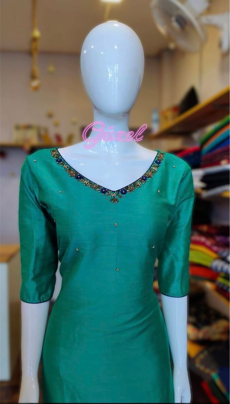 cotton silk kurti with embroidery designs on the neck and 3/4th sleeve length  slitted kurti kurti length:43.5 inches Kurti size:Medium (38) Designer Embroidered Neckline Dress For Diwali, Festive Anarkali Dupatta With Embroidered Neckline, Festive Dupatta With Embroidered Neckline For Eid, Eid Festive Dupatta With Embroidered Neckline, Elegant Embroidered Salwar Kameez, Bollywood Style Kurta With Embroidered Neckline For Diwali, Anarkali Set With Embroidered Neckline, Festive Wedding Dupatta With Embroidered Neckline, Festive Embroidered Neckline Wedding Dupatta