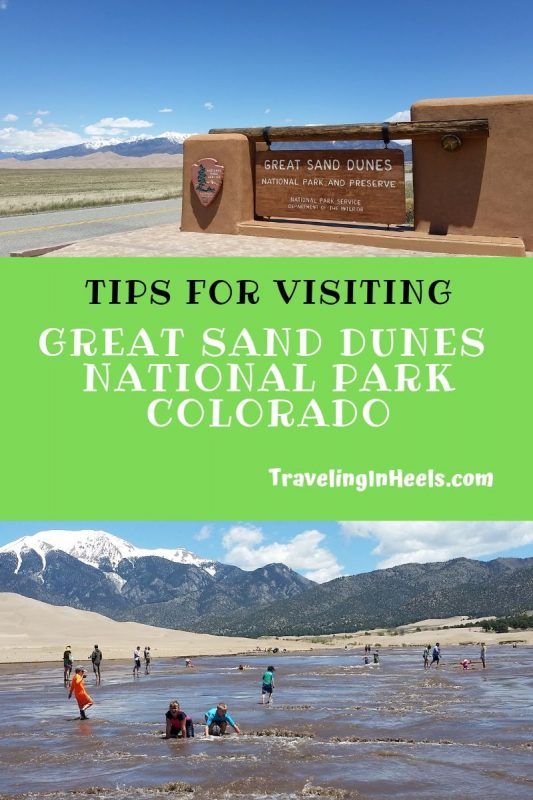 people standing in the water near a sign that says tips for visiting great sand dunes national park colorado