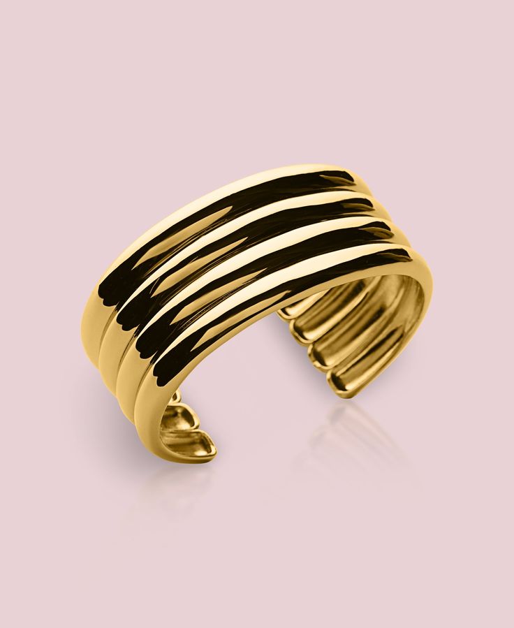 Elegant & Timeless Bangle Jewelry | Oma The Label Enhance your jewelry collection with the elegant and timeless Nicole Ribbed Bangle from Oma The Label. This classic bangle is designed to complement the Nicole earrings, offering a sophisticated shine that completes any outfit. Whether you’re dressing up for a special occasion or adding a touch of elegance to your everyday look, the Nicole Ribbed Bangle is a versatile accessory that elevates your style effortlessly. Features: STMNT Collection: Pa Gold-plated Polished Cuff Bracelet For Formal Occasions, Timeless Gold Cuff Bracelet With Polished Finish, Formal Gold-plated Polished Cuff Bracelet, Formal Gold Plated Cuff Bracelet With Polished Finish, Elegant Yellow Gold Cuff Bracelet For Formal Occasions, Formal Gold Plated Bangle With Polished Finish, Gold-tone Polished Bangle For Formal Occasions, Gold-tone Bangle With Polished Finish For Formal Occasions, Gold-tone Polished Bangle For Formal Events