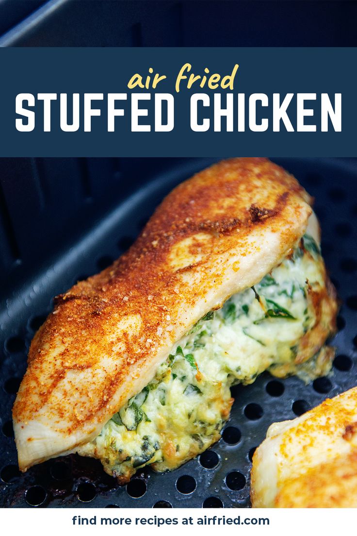 grilled chicken with spinach and cheese on it in an air fryer basket