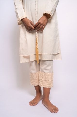 Cream shirt tunic with frayed denim applique embroidery on sleeves. Paired with inner, pant and neck tie. - Aza Fashions Cotton Pants With Tassels For Spring, Spring Cotton Pants With Tassels, Denim Applique, Embroidery Denim, Cream Shirt, Frayed Denim, Applique Embroidery, Pant Set, Embroidered Shirt