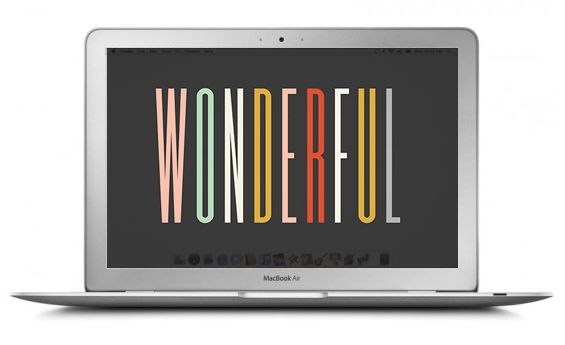 an open laptop computer with the word wonderful on it