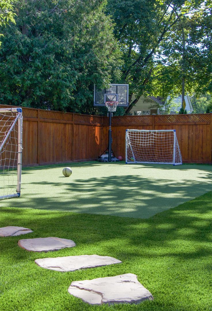 Artificial grass Outdoor Backyard Play Areas, Turf Soccer Field Backyard, Turf Seating Area, Soccer Area Backyard, Grass Area Backyard, Grass Basketball Court, Garden With Football Area, Turf And Grass Backyard, Backyard With Sport Court