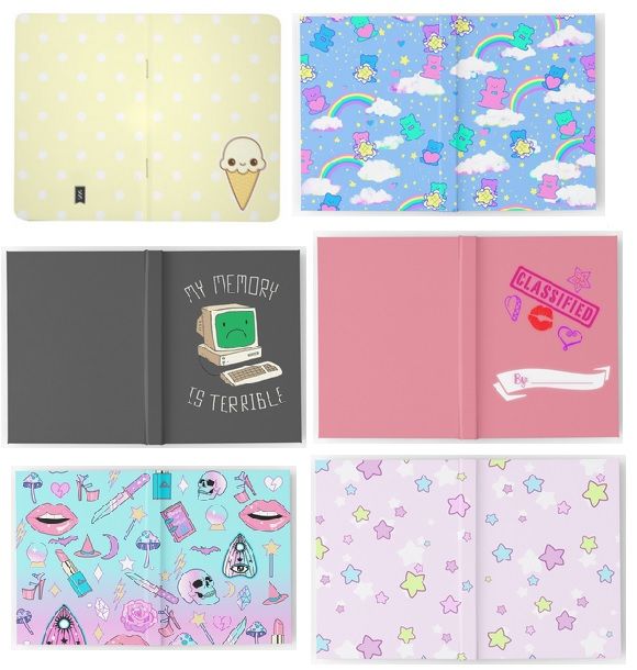 four notebooks with different designs on them, one is pink and the other is blue