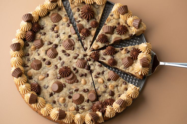 a chocolate chip cookie pie with four slices cut out