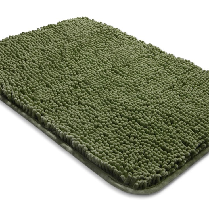 a green rug on a white background with no one in it or someone else is doing something