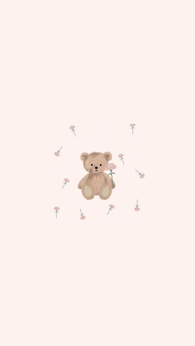 a brown teddy bear sitting on top of a pink wall next to dandelions