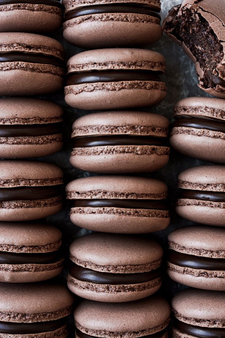 chocolate macaroons stacked on top of each other