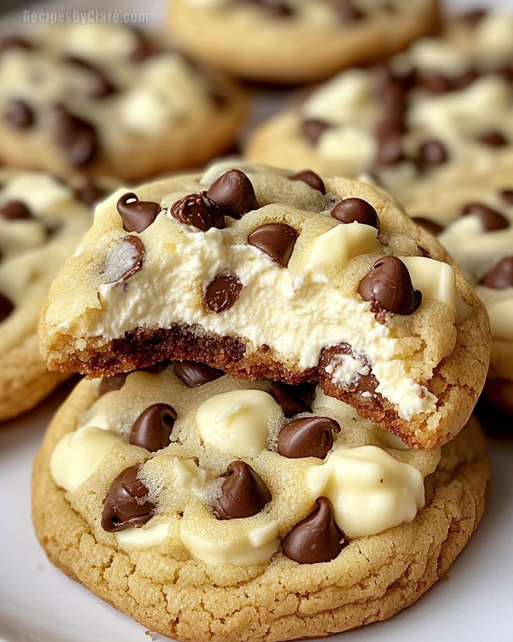 chocolate chip cookies with cream filling on a white plate