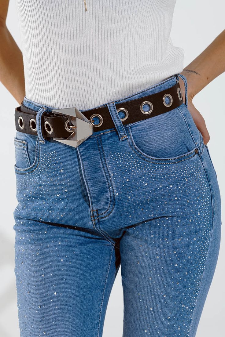 Elevate your denim game with our Washed Blue Skinny Jeans, adorned with dazzling strass designs all over the front in various shapes and sizes. These jeans feature a super skinny fit, perfect for creating a sleek and trendy silhouette. Made from a blend of 82% cotton, 16% polyester, and 2% elastane, they offer just the right amount of stretch for a comfortable fit. With five pockets and a zip and button closure, these jeans are a versatile choice for both casual and elegant styles this spring. Model Info: Model is wearing size S. Model's measurements: 33-23-35, Height: 5'9''. Key Features: Super skinny fit for a sleek and trendy silhouette. Dazzling strass detail all over the front for added glamour. Made from stretch denim for comfort and flexibility. Five pockets and zip fastening for pr Types Of Jeans, Elegant Styles, Knitwear Tops, Spring Wardrobe, Jeans Jumpsuit, Hat Hairstyles, Elegant Fashion, Short Pants, Jeans Pants