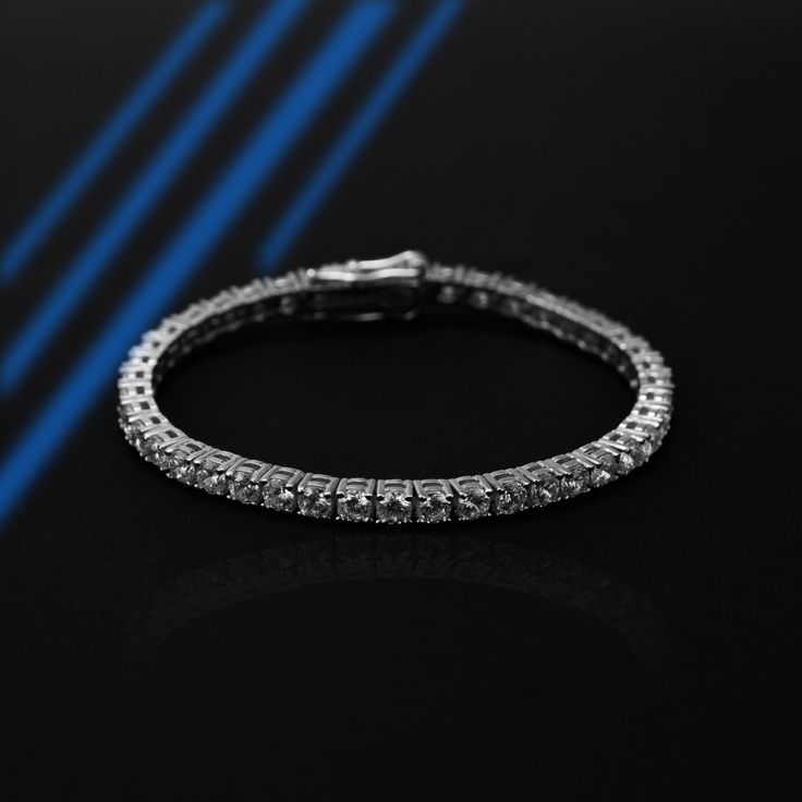 Tennis Bracelet | S925 Sterling Silver, Simulated Diamond Bracelet | Gifted Jewelry 𝐃𝐞𝐬𝐜𝐫𝐢𝐩𝐭𝐢𝐨𝐧 ✧ 𝐏𝐫𝐞𝐦𝐢𝐮𝐦 𝐐𝐮𝐚𝐥𝐢𝐭𝐲 𝐌𝐚𝐭𝐞𝐫𝐢𝐚𝐥: Crafted from high-quality S925 sterling silver for lasting shine and durability. ✧ 𝐂𝐮𝐛𝐢𝐜 𝐙𝐢𝐫𝐜𝐨𝐧𝐢𝐚 𝐒𝐭𝐨𝐧𝐞𝐬: Each CZ stone is carefully selected to mimic the brilliance of real diamonds, providing an ethical and affordable luxury. ✧ 𝐂𝐥𝐚𝐬𝐬𝐢𝐜 𝐒𝐭𝐲𝐥𝐞: The iconic tennis bracelet design ensures it complements any outfit. ✧ 𝐏𝐞𝐫𝐟𝐞𝐜𝐭 𝐆𝐢𝐟𝐭: Elegantly packaged, making it an ideal gift for any occasion. Elevate your style with our Tennis Bracelet, where sophistication meets affordability. 𝐒𝐩𝐞𝐜𝐢𝐟𝐢𝐜𝐚𝐭𝐢𝐨𝐧𝐬 − 𝐌𝐞𝐭𝐚𝐥: S925 Sterling Silver − 𝐅𝐢𝐧𝐢𝐬𝐡: Silver, Gold, Rose Gold − 𝐒𝐢𝐳𝐞: 6in, 7 Bracelet Tennis, Bracelets Design, Wedding Jewelry Bracelets, Bracelet Design, Affordable Luxury, Wedding Bracelet, Tennis Bracelet, Cz Stone, Real Diamonds