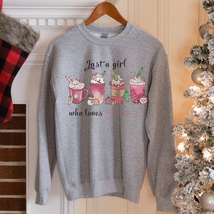 Cute graphic sweater for your christmas holiday outfit. Our sweatshirts are soft, light and warm, making them the perfect everyday staple. Cozy Graphic Print Sweater For Winter, Cozy Graphic Print Winter Sweater, Fall Holiday Cotton Sweatshirt, Cotton Sweatshirt For Fall Holiday, Cozy Holiday Sweatshirt For Fall, Cozy Sweatshirt For Holiday And Fall, Cozy Sweatshirt For Fall Holiday, Cozy Fall Holiday Sweatshirt, Relaxed Fit Holiday Sweatshirt For Fall