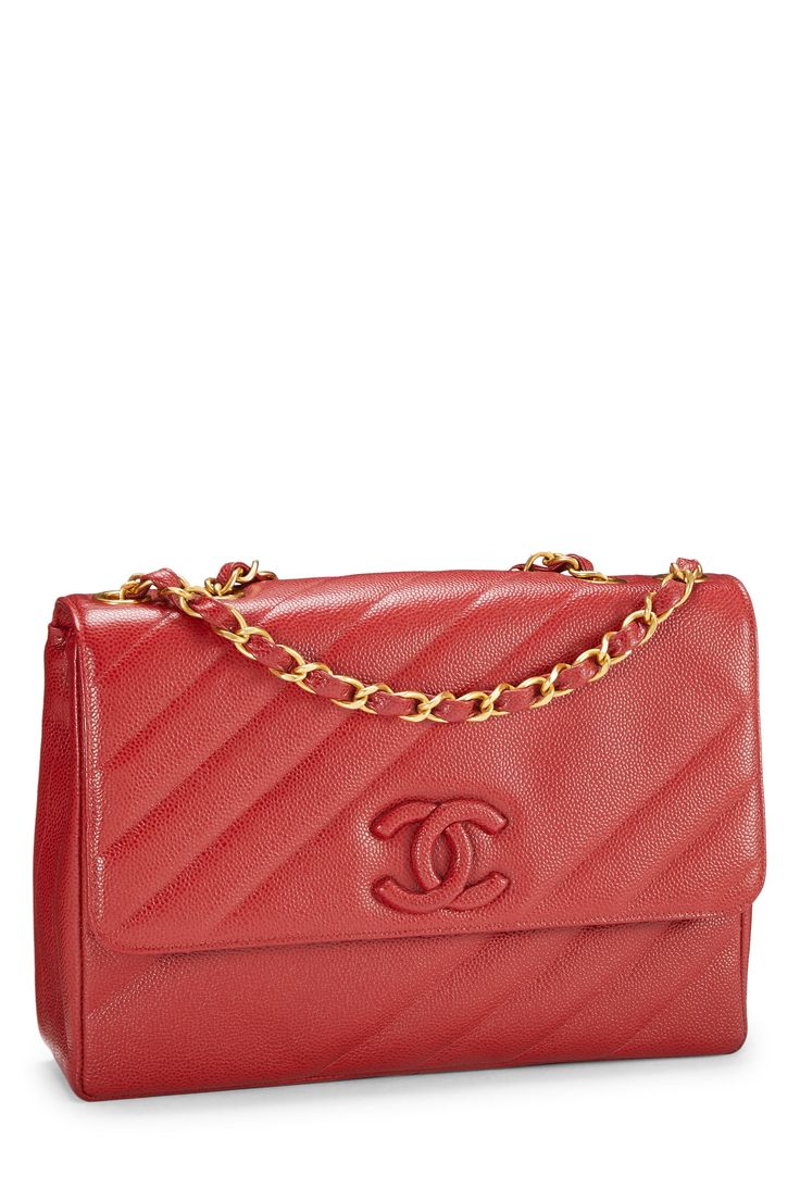 Find CHANEL Diagonal Flap Jumbo on Editorialist. This Chanel bag features a quilted design, a flap closure with a turn lock, a gold tone chain strap, and the Chanel logo on the front. Classic Red Quilted Shoulder Bag, Red Quilted Shoulder Bag For Formal Occasions, Red Quilted Shoulder Bag For Formal Events, Formal Red Quilted Shoulder Bag, Luxury Red Shoulder Bag With Cc Turnlock Closure, Classic Red Shoulder Bag With Cc Turnlock Closure, Red Quilted Leather Shoulder Bag, Formal Quilted Double Flap Bag, Designer Quilted Flap Bag For Formal Events