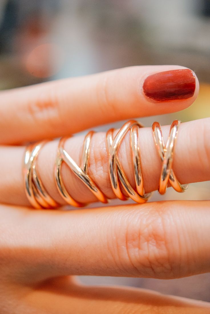 A bold, layered ring. This beautiful wrapped ring will become a staple in your wardrobe. This ring is handcrafted out of a D-shaped (half round) wire that is wrapped multiple times to create the appearance of three stacked rings. This listing is for ONE SINGLE ring in 14K ROSE GOLD FILL. Made from Extra Thick 2mm metal. SIZING NOTE: Because this style is wider than a classic Stacking Ring, we recommend sizing up* by a QUARTER to a HALF size from your US Fashion Ring Size (Bridal size is differen Stacked Rings, Interlocking Ring, Us Fashion, Layered Rings, Single Ring, Flat Back Earrings, Bold Rings, Stacking Ring Set, Band Design