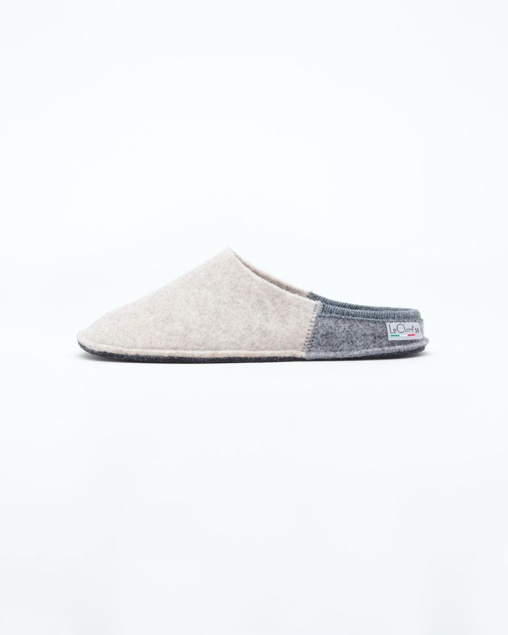 Description: The Nuvola Bico in beige and grey is our soft clog slipper, fully crafted in wool with a 1.5 cm interior heel height EVA insole for added comfort. The Nuvola retains the look of a slipper with the cushioned feel of a sneaker. Designed for the perfect amount of support and feather lightweight, Nuvola feels almost like walking on a cloud. Details: 100% Wool felt upper Two tone design: Colored front with light grey rear and insole Removable 1.5 cm interior heel height EVA insole - for Beige Slip-on Comfortable Clogs, Beige Slip-on Comfortable Slippers, Beige Comfortable Slip-on Clogs, Comfortable Beige Slip-on Clogs, Beige Cushioned Slippers For Indoor Use, Casual Wool Slip-on Clogs, Casual Wool Slip-on Slippers, Classic Beige Clogs With Rubber Sole, Comfortable Wool Closed Toe Clogs