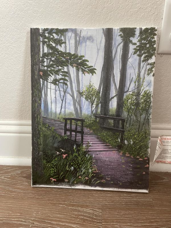 a painting of a bench in the woods