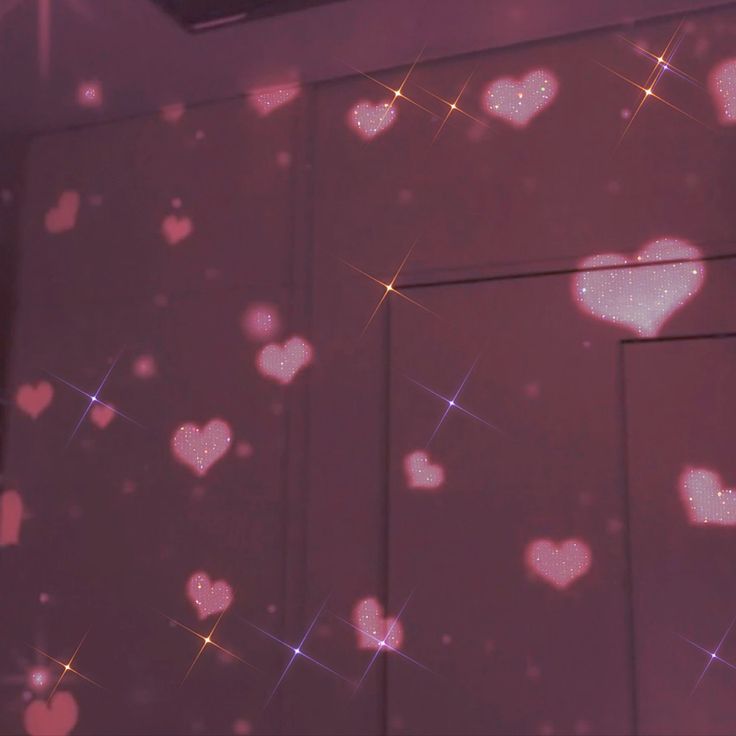 the wall is covered with hearts and stars