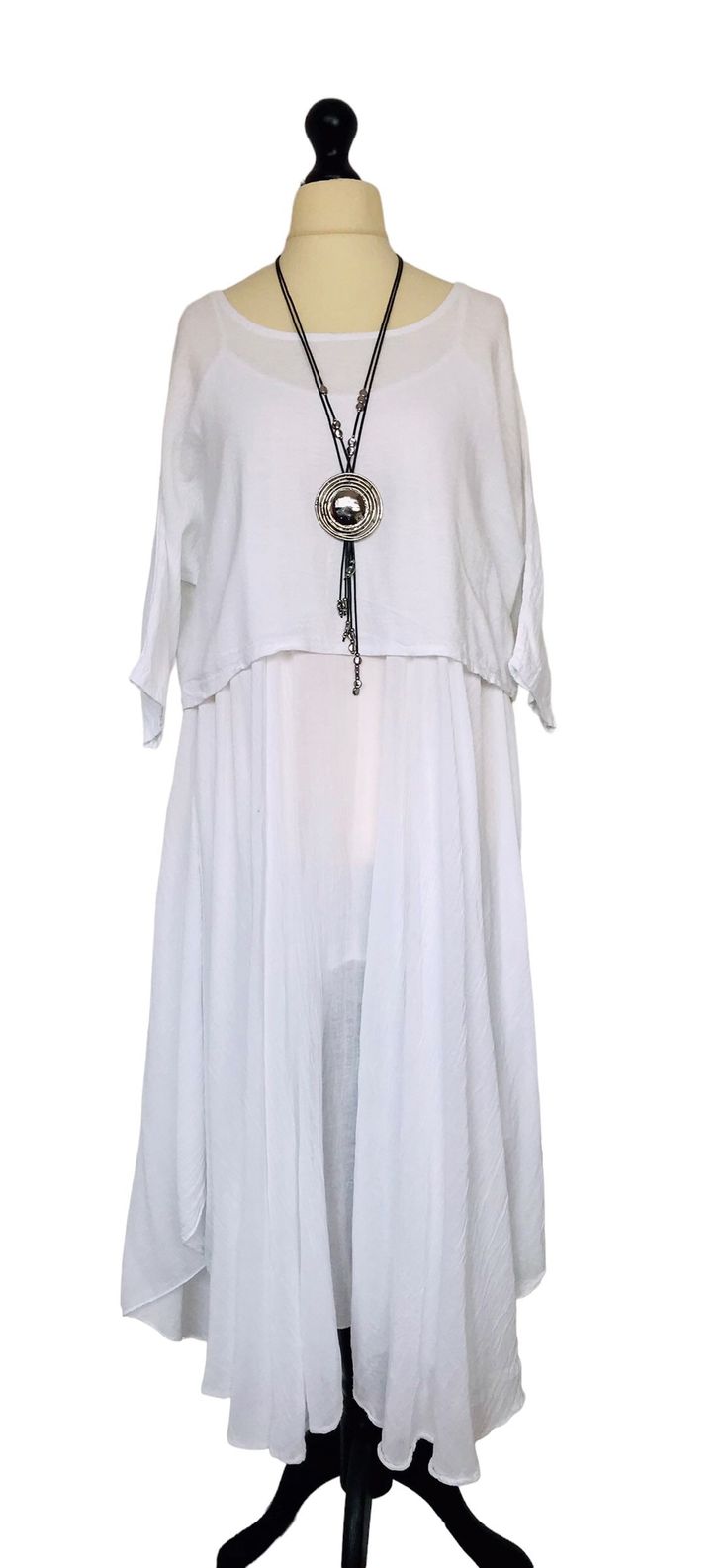 . Made In Italy Lagenlook White Cotton 2 Piece Dress . Stunning 2 piece dress consists of a longer length full floaty sleeveless dress fully lined and a short boxy tunic top with 3/4 length sleeves in a contrasting fabric . 100% cotton . One size - to fit UK sizes 12 14 16 . Bust on dress measures : 46 inches / 117 cms . Length of complete outfit from back of neck to bottom hem : 47 inches / 119 cms . Brand new with tags ( necklace not included ) . Visit our shop for lots more gorgeous Italian l White Two-piece Summer Dress, Sleeveless Two-piece Bohemian Dress, White Sleeveless Two-piece Dress For Summer, Flowy Spring Dress With Overlay, Flowy Summer Dress With Overlay, White Fake Two-piece Dress For Spring, Summer Sleeveless Dress With Fake Two-piece Design, Summer Sleeveless Dress With Fake Two-piece Detail, Long Sleeve Dresses With Overlay For Summer