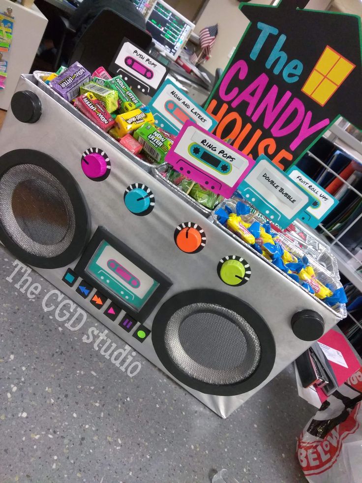 an old school radio with candy on the front and back sides is displayed in a store