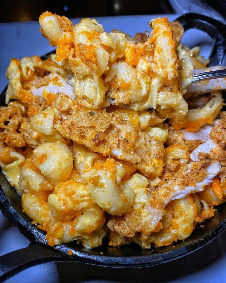 a skillet filled with macaroni and cheese