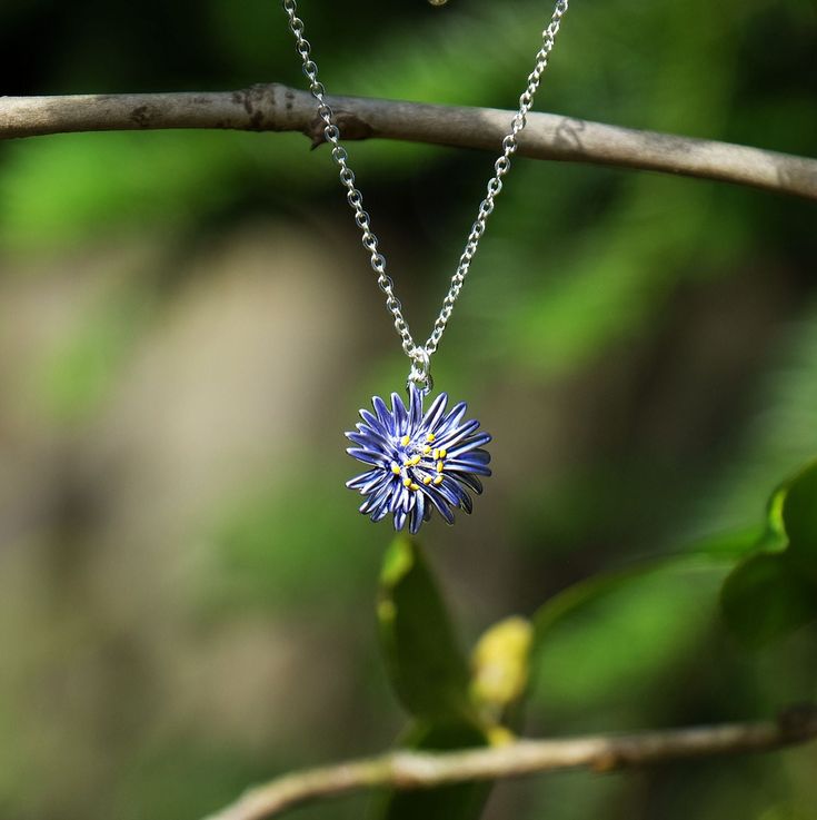 The Aster flower represents the birth month of September, 20th Wedding Anniversary, love, patience and makes a special gift. Aster blue hand enamelled rhodium tone pendant necklace. Designed by us, at our London office. Presented on a gift card (as shown). Our beautiful pendant embodies nature with its intricate design and attention to detail. The pendant is on a 41cm chain, with 7.5cm extension chain and lobster clasp. Matching earring and brooch available. This is just one design from a range of classic flower jewellery. Please do take a look at our other styles. All our products conform to EU directives on safety. 20th Wedding Anniversary, 20 Wedding Anniversary, Aster Flower, Classic Flower, London Office, Blue Hand, Flower Pendant Necklace, Birth Month, Silver Enamel