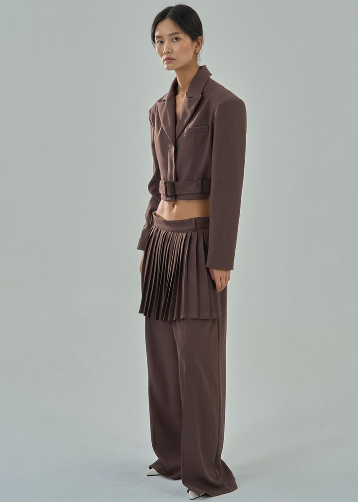 Color: Brown Midweight woven fabric Regular fit Wide leg Front pleated skirt detailing Side seam pockets Back illusion welt pockets Concealed side zip closure Unlined 97% Polyester 3% Elastane Dry Clean Imported Brown Pleated Wide Leg Bottoms, Stretch Brown Pleated Bottoms, Brown Pleated Cotton Bottoms, Brown A-line Pleated Bottoms, High-waist Brown Parachute Pants With Pockets, Welt Pockets, Welt Pocket, Skirt Pants, Side Zip