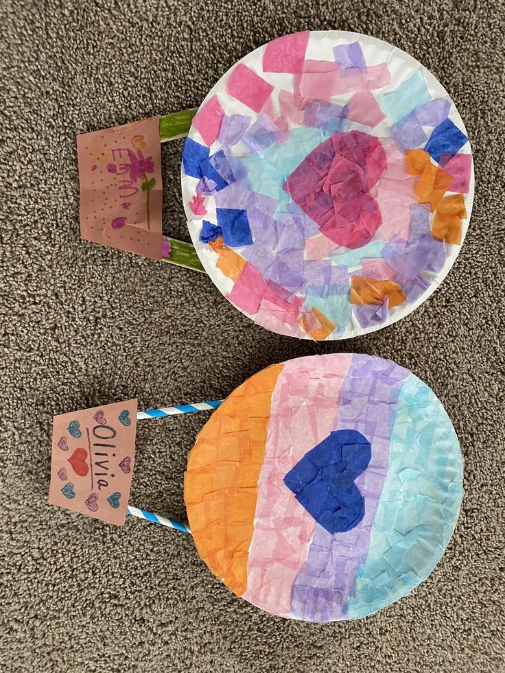 two paper plates that have been made to look like they are being used as crafts