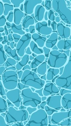 an image of a swimming pool with rocks in the water and blue sky above it