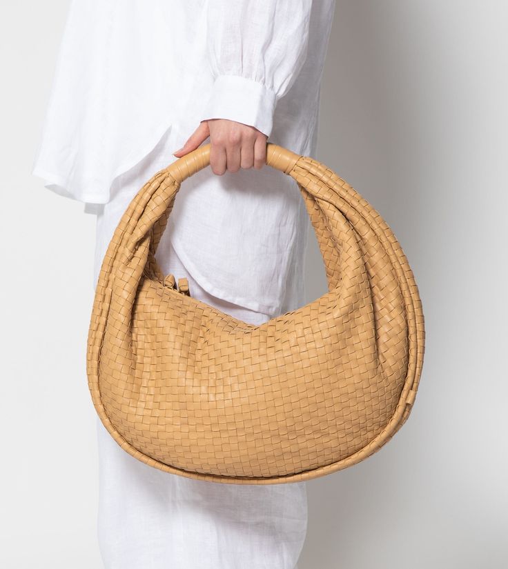 Santiago Hobo Bag | Tan Totes Cleobella Daily Use Baguette Bag With Braided Handles, Daily Use Baguette Bag With Braided Top Handle, Modern Hobo Bag With Braided Handles For Everyday, Leather Baguette Bag With Round Handle For Everyday, Everyday Handheld Hobo Bag With Braided Handles, Natural Color Handheld Hobo Bag For Everyday Use, Natural Handheld Hobo Bag For Everyday Use, Handheld Natural Color Hobo Bag, Everyday Natural Color Handheld Hobo Bag