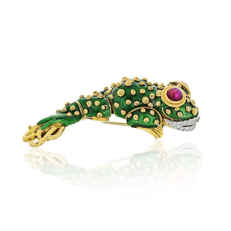 For Sale on 1stDibs - 18 kt., the stylized tadpole applied with green enamel and applied gold spiral spots, with two collet-set oval cabochon ruby eyes further edged by twisted Haute Jewelry, Cabochon Ruby, David Webb, Lip Set, Hammered Gold, Green Enamel, Lovely Jewellery, Oval Cabochon, Gold Metal